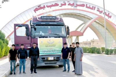 موكب جنوب الولاء لحامل اللواء في خدمة الزائرين في طريق النجف الأشرف وكربلاء المقدسة