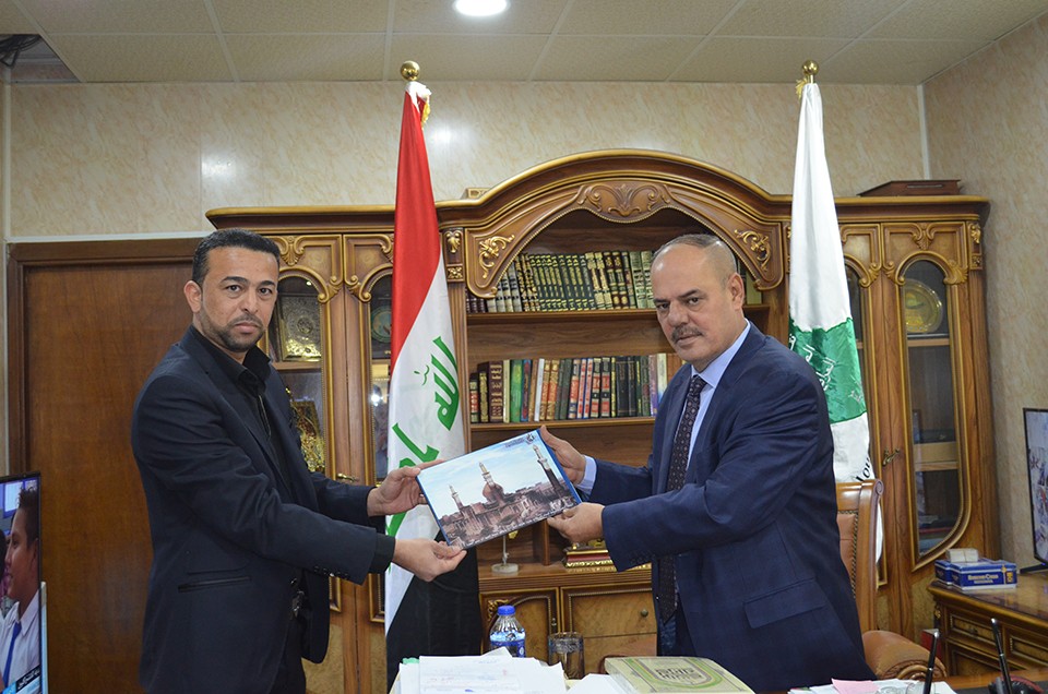 وفد مركز تراث كربلاء يزور نقيب الصحفيين العراقيين